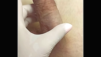 Video tutorial on what to do for a depilation master with Spontaneous ejaculation while trimming. SugarNadya show that the penis must be held tight and not released until the very last spray