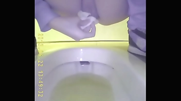Asian teen pee in toilet 3