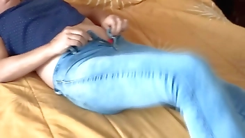 My wife's in our bedroom very excited masturbates, hairy pussy, she wants to suck my cock, she wants me to fuck her, she wants a cock, at the end I make her a cumshot on her big ass with my jean on