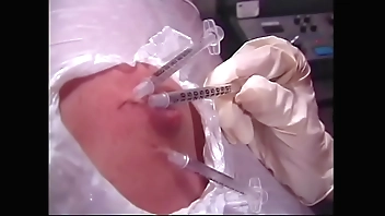 A naughty brunette and a busty redhead bitches wrapped a guy's body with a film and injected him with syringes