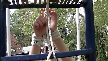 Nyssa Nevers Tied To The Slide, Outdoor Bondage