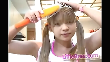 Little Bree brushers her hair and then shows you her tiny pussy