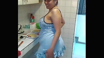Busty making breakfast