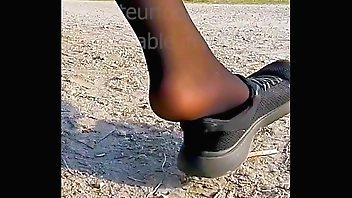 Shoeplay Dangling Dipping Nylons sneakers Feet footfetish clip video foot toe Girl slips out of her sweaty stinky shoes