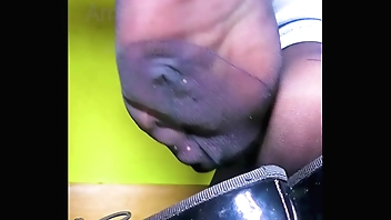 Girl shoeplay sweaty stinky nylons feet plays with her black lacquer ballerinas flats shoe play