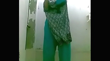 bottle bating indian wife in shower for a selfie
