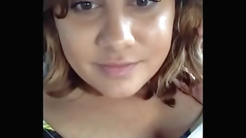 Chubby milf plays with her pussy in the car