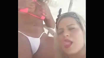 Luna Oliveira shows off her pussy and gets a nice blowjob on the beach