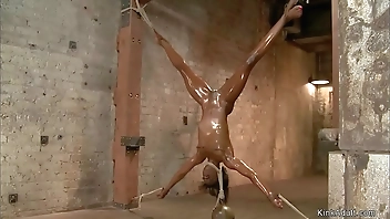 Ebony toyed in upside down position