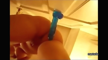 Alexis 19 fucks blue dildo mounted on door and squirts