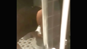 fucked from behind in a public toilet