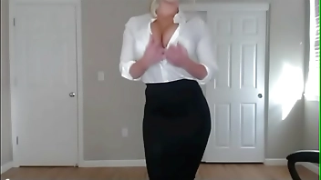 Sexy blonde with big tits Striptease