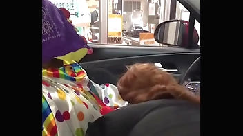Clown gets dick sucked while ordering food