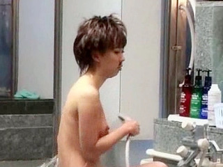 Japanese, Thai and Chinese chicas clean their hot bods in the bathroom after a hard day's work.