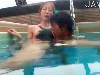 Japanese slut gets wet and horny in a XXX Tokyo pool